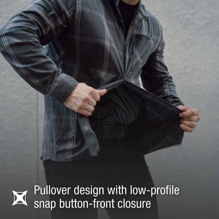 Product photography showing a man displaying a gray and black plaid shirt with concealed carry features showcasing a low-profile snap button front closure and dark gray undershirt against a neutral background