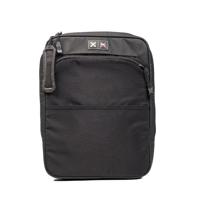 Product photography of a black VXG laptop backpack featuring a mesh pocket, zipper pulls, and a branded patch