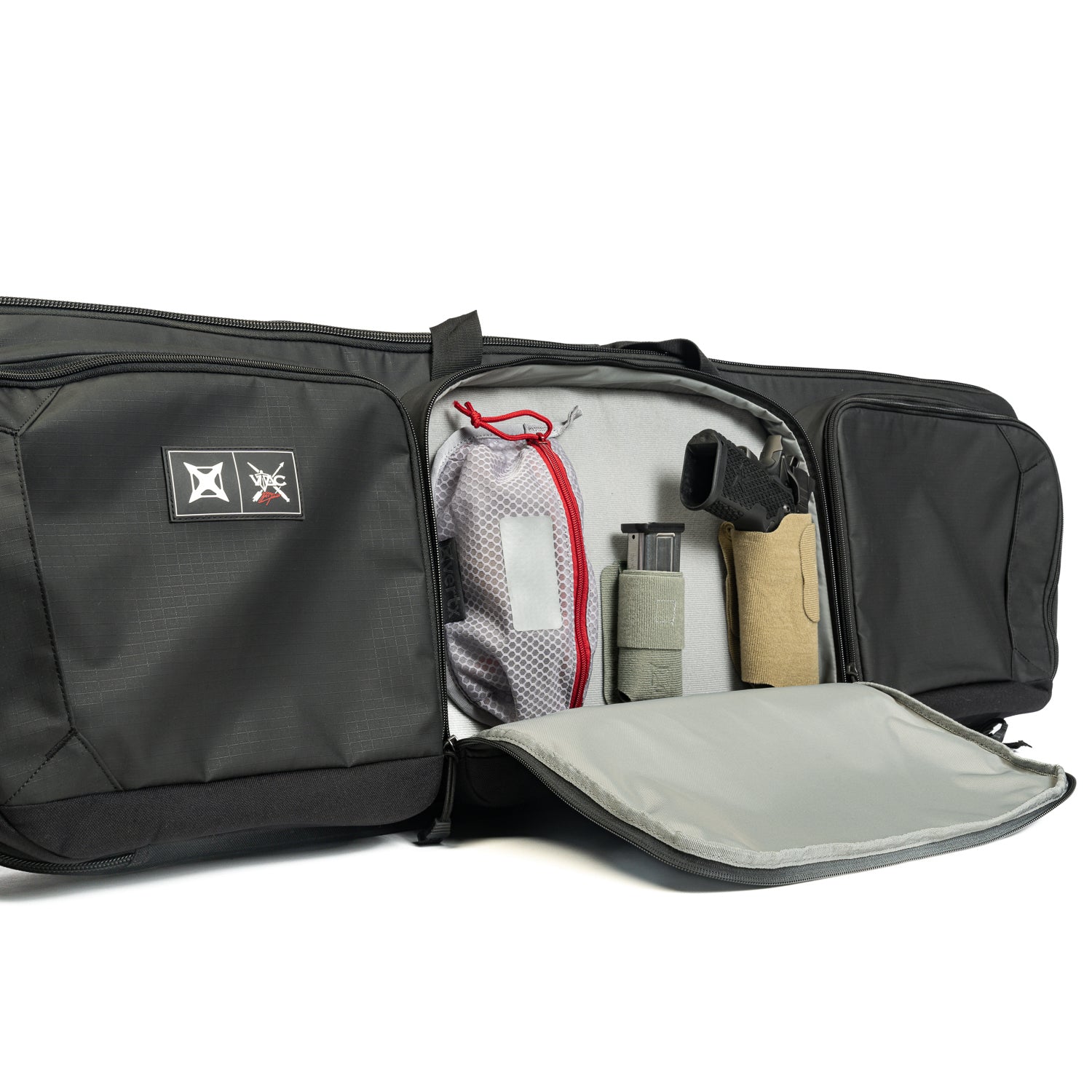 Product shot showing a black Viridian Weapon Technologies range bag open to reveal a handgun, magazine, and other accessories including a gray pouch and tan holster on a white background