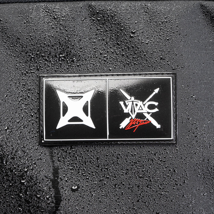 Unknown artist graphic design featuring a black and white logo with red accents and water droplets on a dark surface