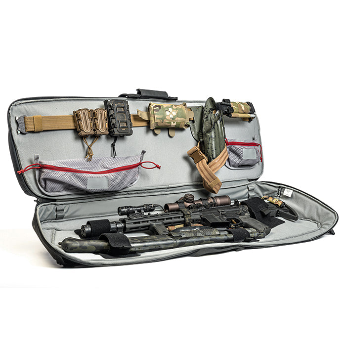 Product photography shows a gray tactical rifle case containing a rifle with scope, a pistol, and various accessories including tan and green pouches and straps featuring a red zipper pull and camouflage pattern