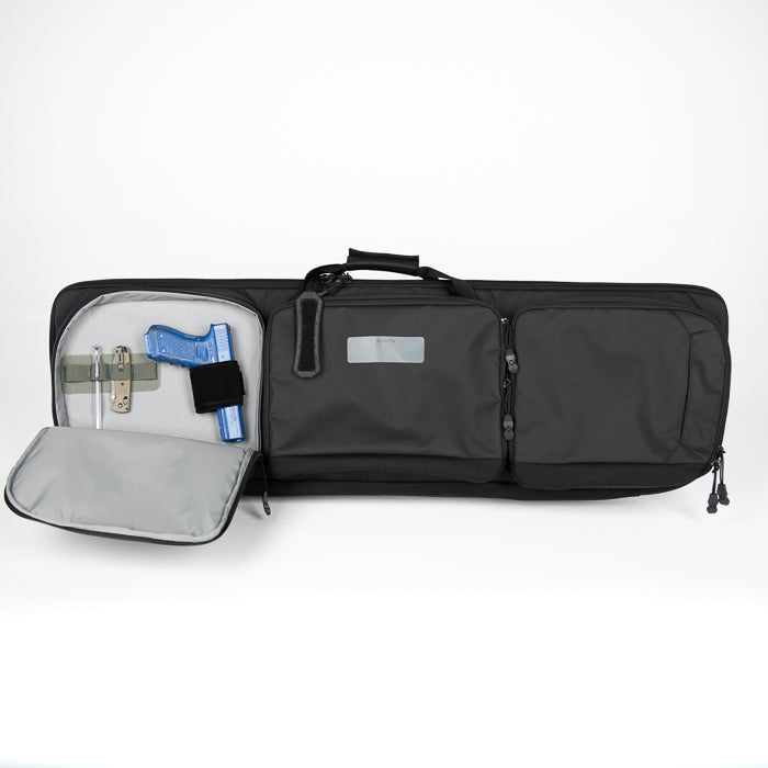 Product photography showing a black padded gun case with multiple compartments a blue handgun gray interior and zippered pockets