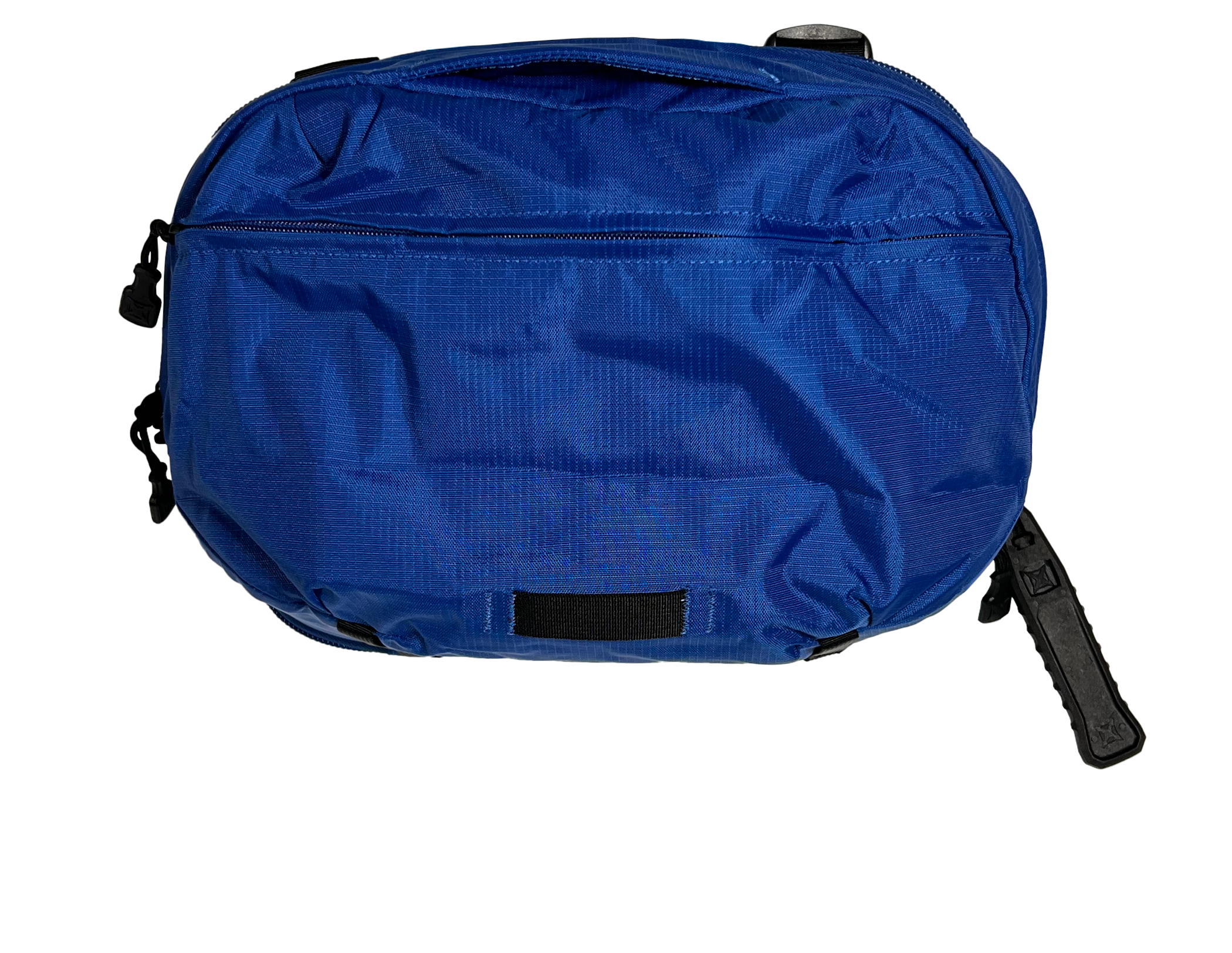 Close-up photo of a vibrant blue Osprey Packs Ultralight Stuff Pack featuring a textured fabric, black zipper, and sturdy black plastic buckle.