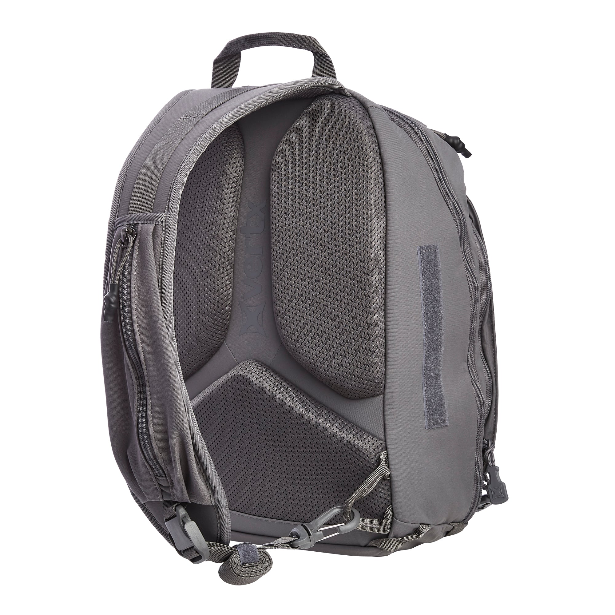 Charcoal grey Vertx backpack viewed from the back showing its padded mesh ventilation panel, multiple zippered compartments, and side Velcro patch