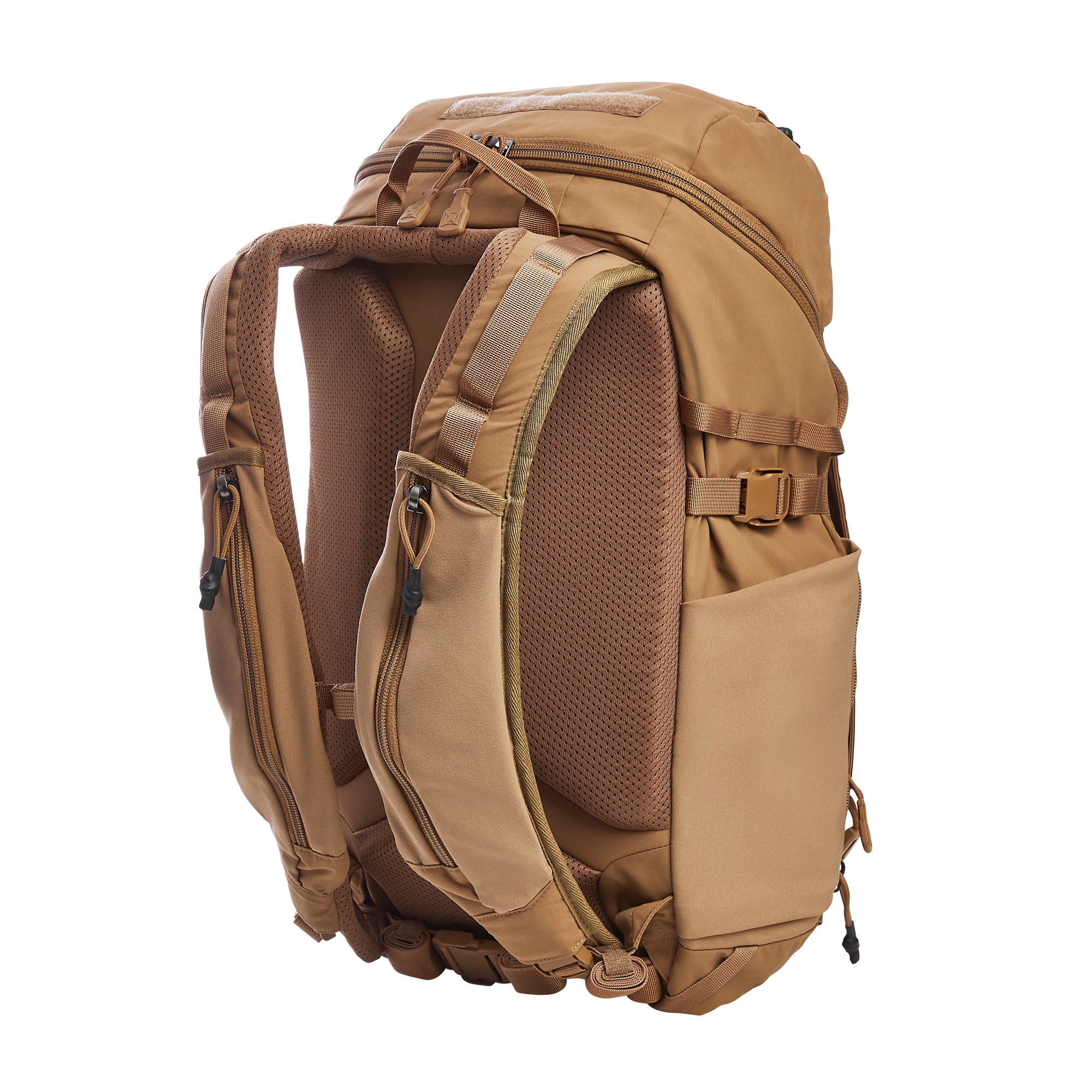 Tan tactical backpack featuring a padded mesh back panel, adjustable shoulder straps, multiple zippered pockets, and a top velcro patch panel isolated on a white background