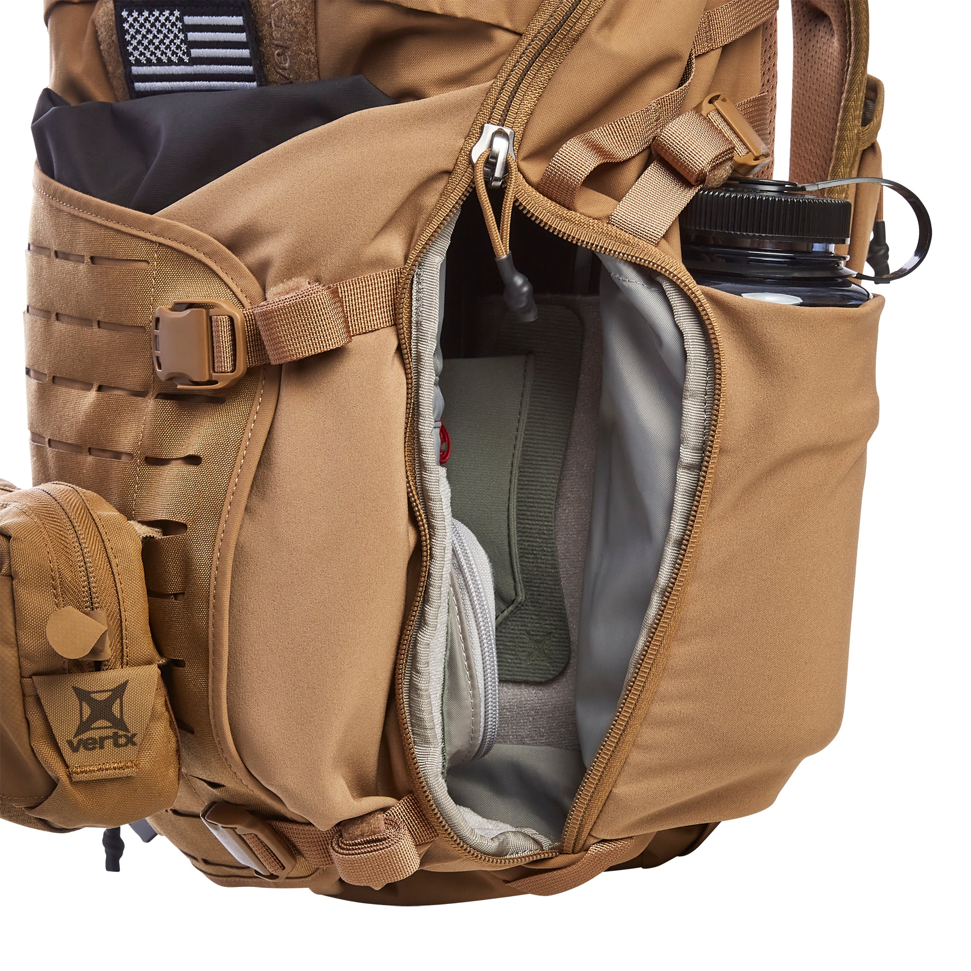 Product photograph of a tan tactical backpack with its main compartment unzipped revealing a light grey lining, a black US flag patch on the top flap, and a black Nalgene bottle in a side pocket