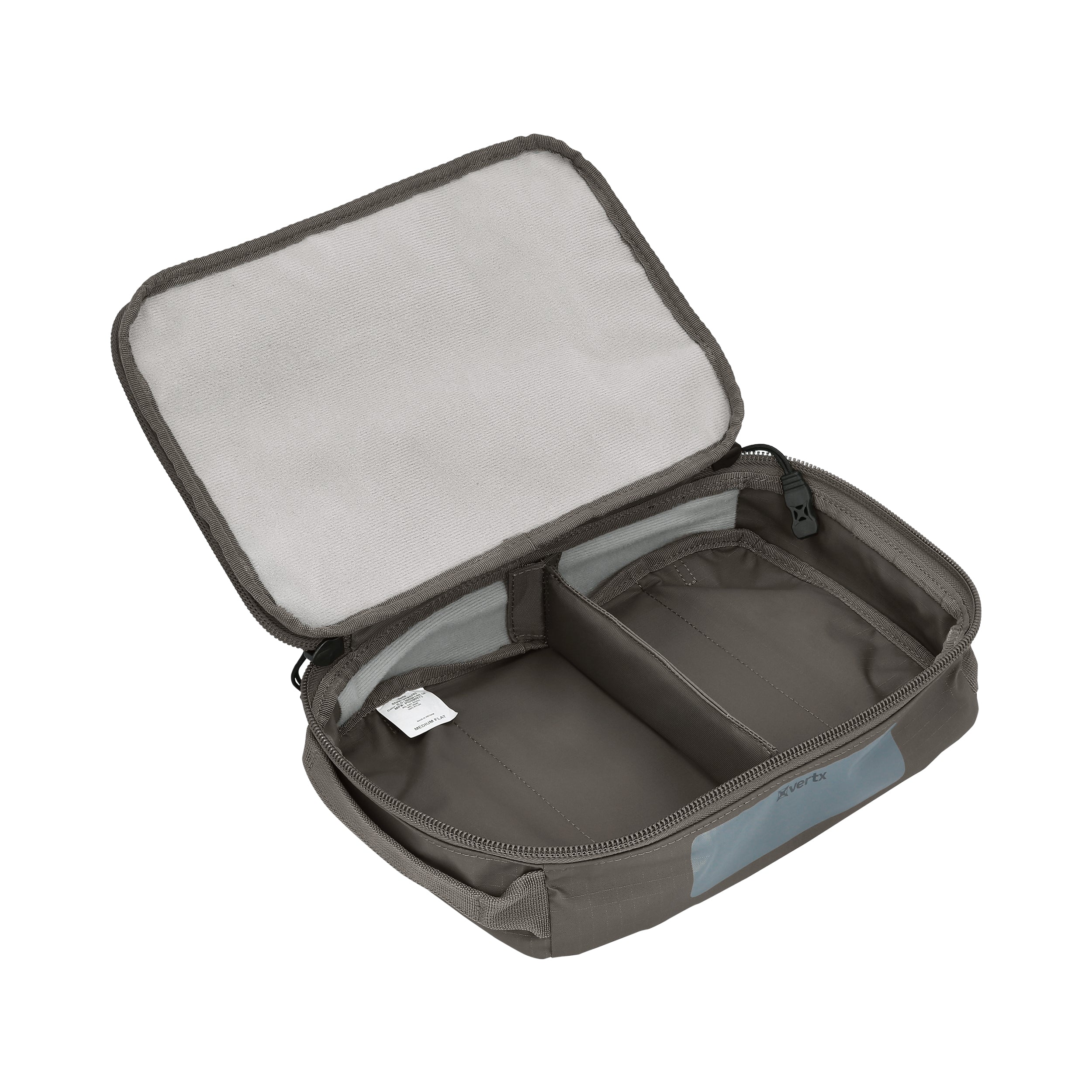 Product shot of a Vertx Medium Flat gray travel organizer featuring a zipper closure, internal dividers, and a light gray interior lining