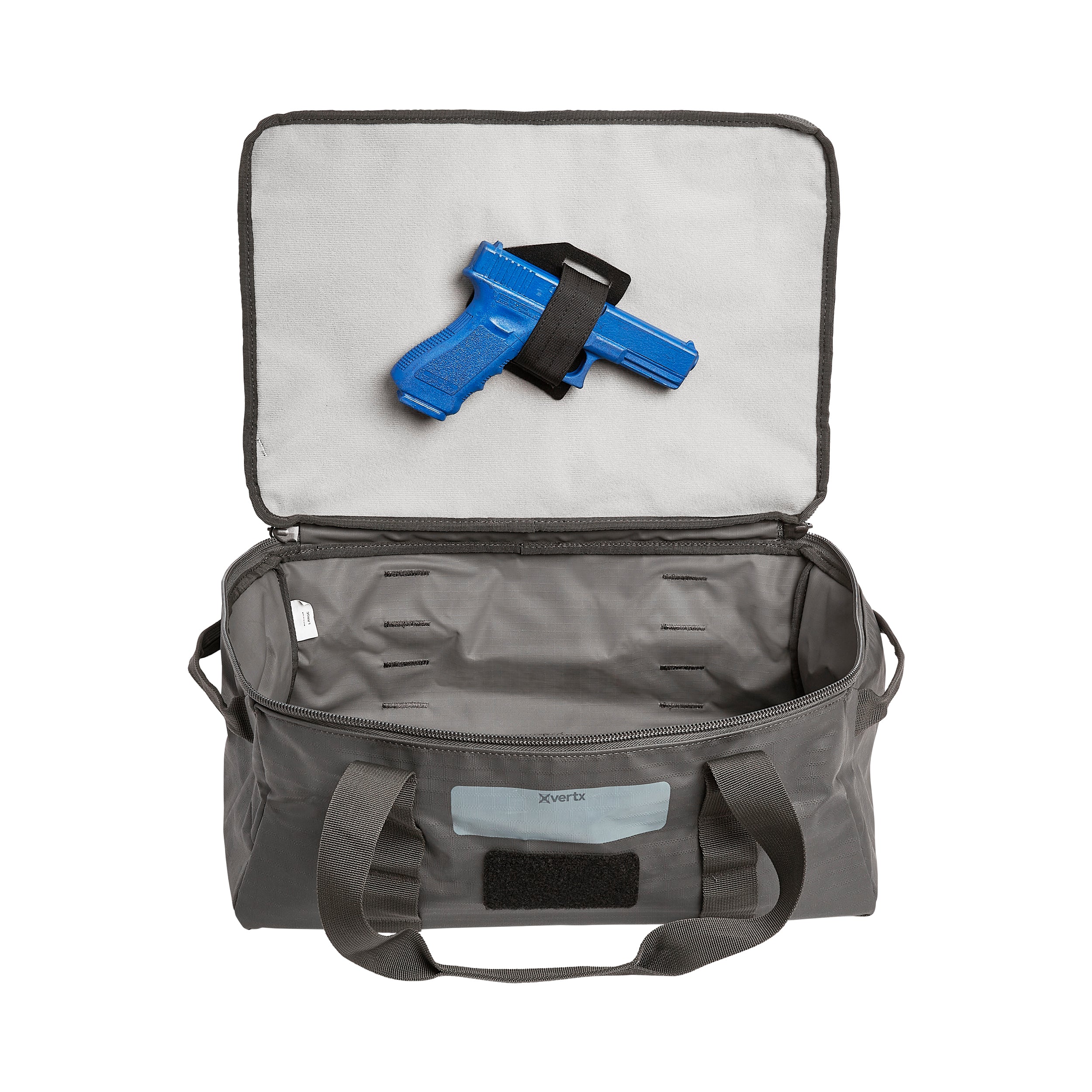Product photography shows a gray Vertx bag with a bright blue handgun secured inside featuring a gray interior lining and black accents