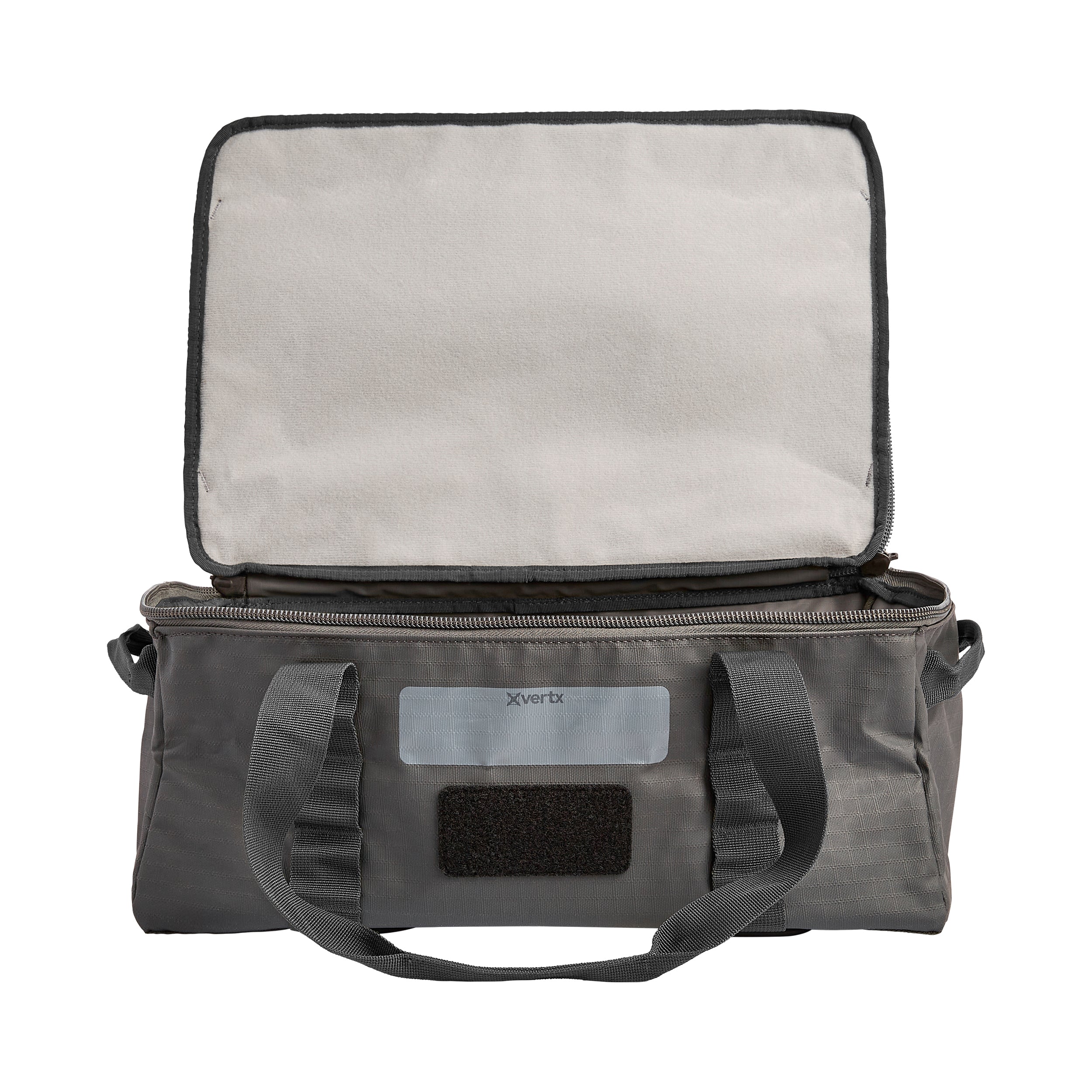 Product photography of a gray Xvertx duffel bag with a light gray interior a zipper closure and sturdy black straps showing a small velcro patch