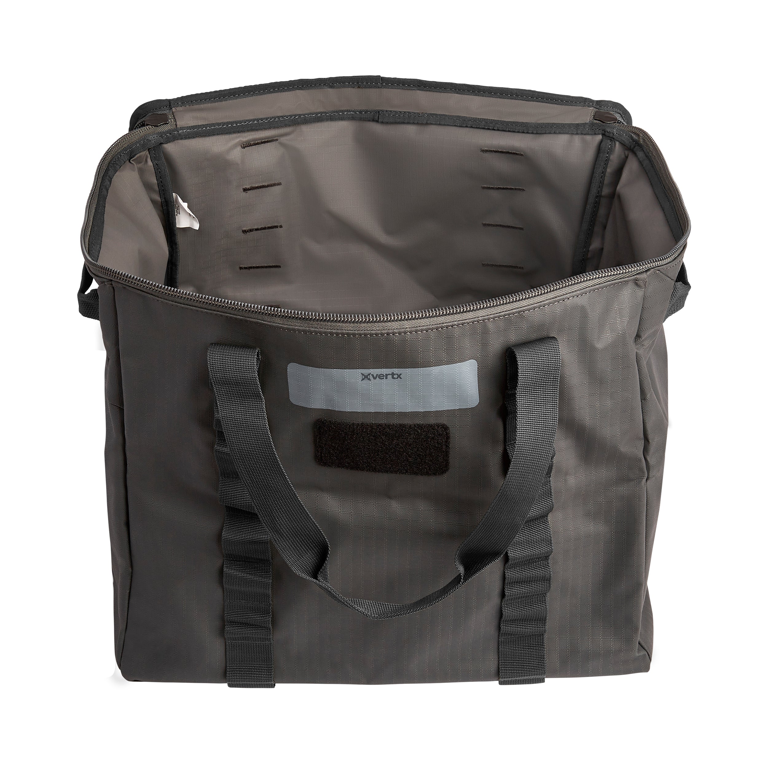 Product shot of an open Xvertx dark gray fabric tote bag featuring a zipper, reinforced stitching, and sturdy black handles against a white background