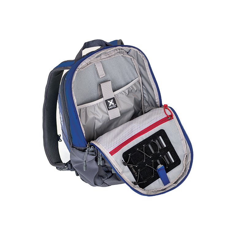 Product shot of a blue and gray AvertX backpack open to reveal its interior compartments including a red zipper and multiple organizational pockets