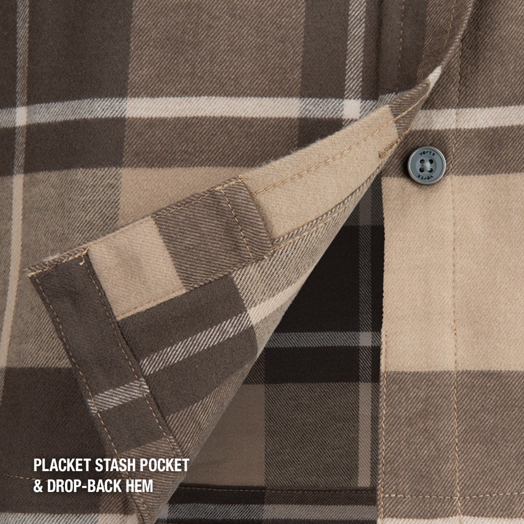 Close-up of a Vortex flannel shirt showcasing a placket stash pocket and drop-back hem featuring brown beige and white plaid pattern a hidden pocket and detailed stitching