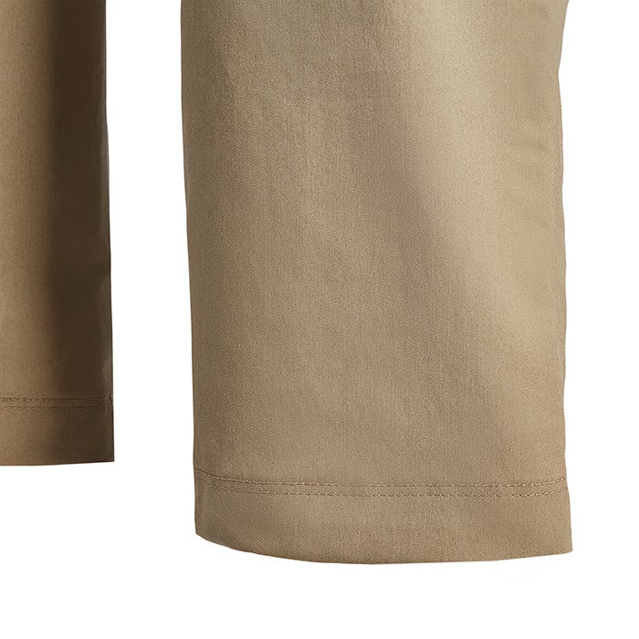 Close-up of a khaki-colored fabric showing subtle texture and even stitching with a muted tone and smooth surface