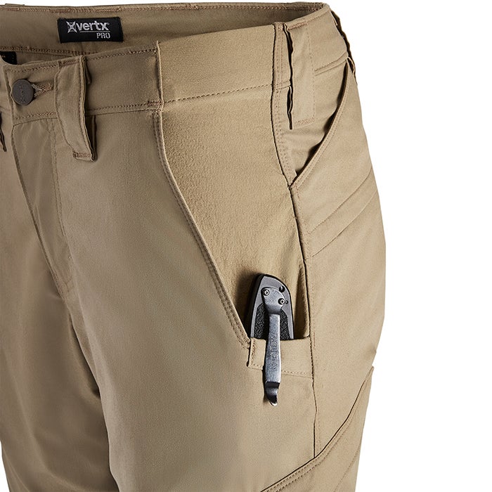 Product shot of tan Xvertx Pro pants showing multiple pockets a multi-tool in a pocket and detailed stitching