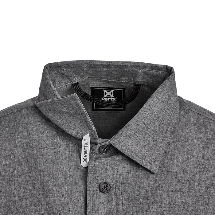Close-up of a charcoal gray Vertx shirt featuring a black drawstring, branded buttons, and a minimalist logo tag