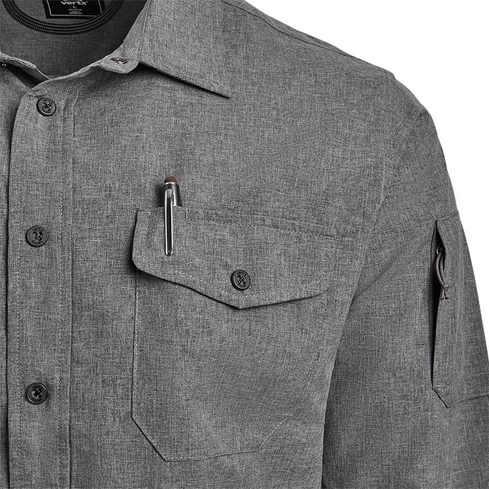 Close-up of a gray Vertex brand shirt featuring a pen in the chest pocket, a zippered sleeve pocket, and dark gray buttons.