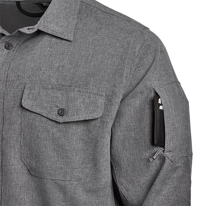 Product shot of a gray heather long sleeve shirt featuring a hidden sleeve pocket a buttoned chest pocket and subtle textured fabric