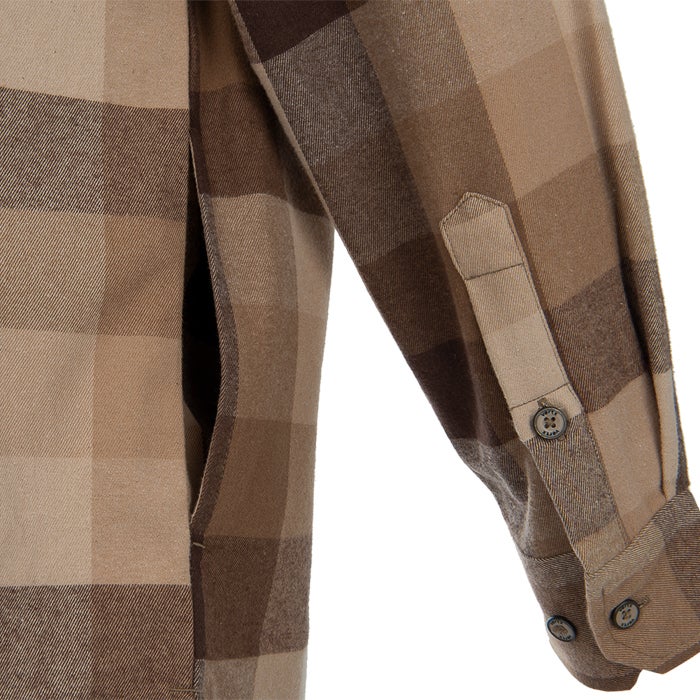 Close-up of a brown and beige plaid flannel shirt showing a pocket, cuff detail, and unique button design