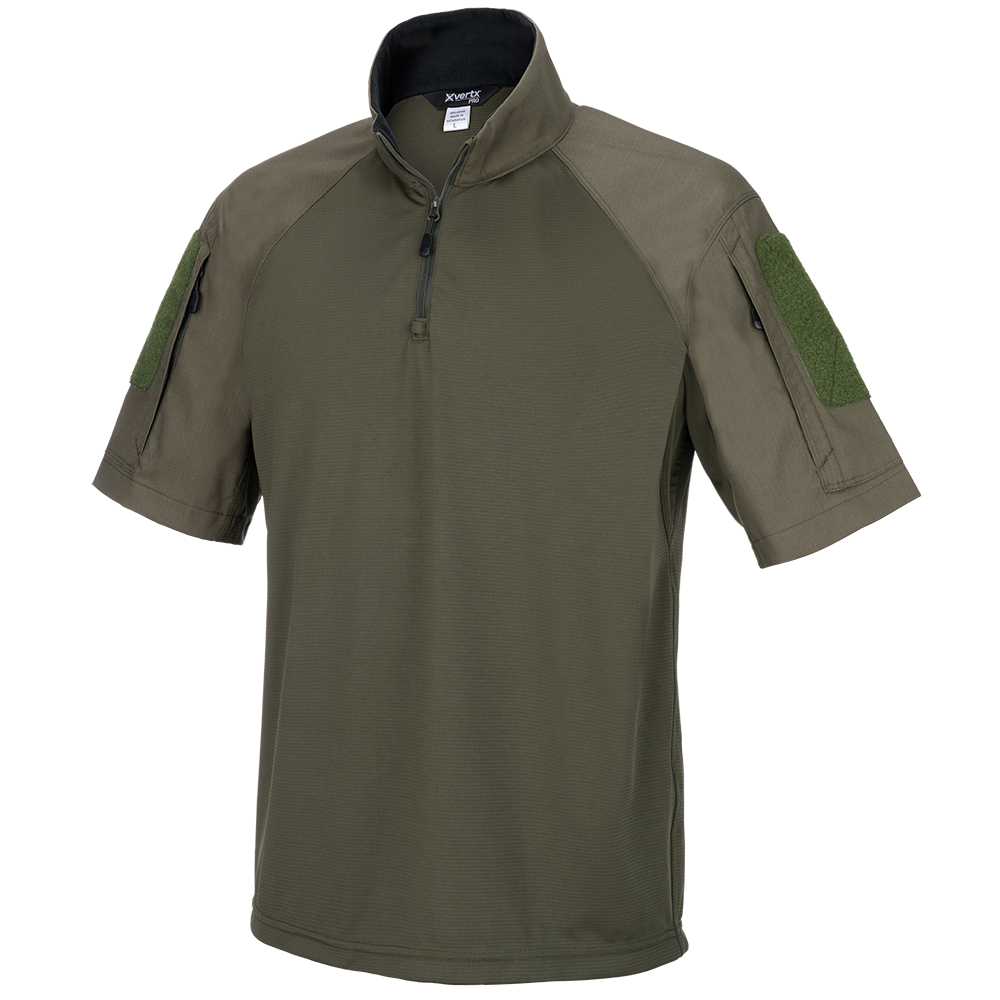 Product shot of an olive green Xvert Pro short sleeve shirt featuring a half-zip closure and two velcro patches a black collar and textured fabric