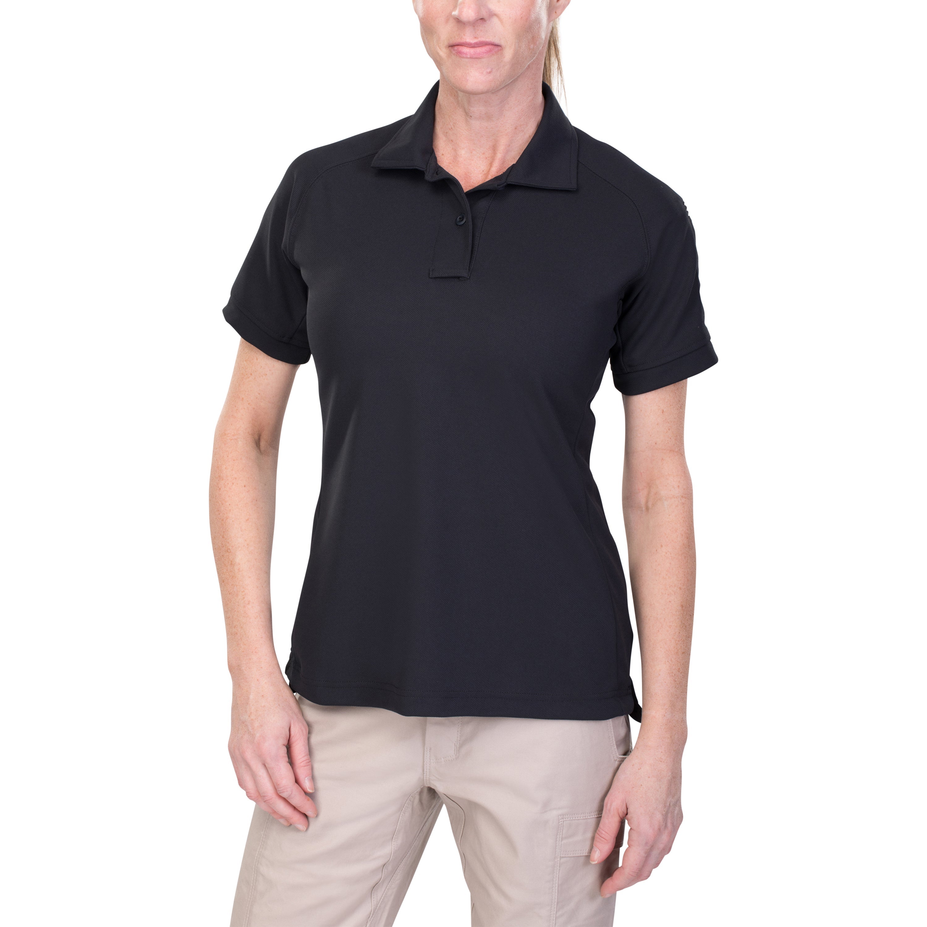 Product shot of a black women's short-sleeved polo shirt with khaki pants against a white background showing the shirt's texture and the subtle details of the collar and cuffs