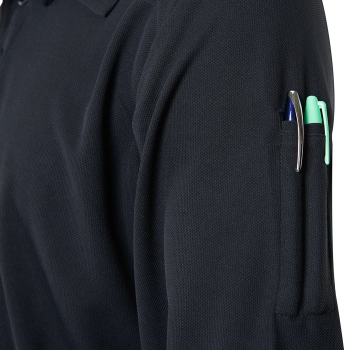 Close-up of a black long-sleeved polo shirt showing a pen and highlighter in the sleeve pocket the fabric is textured with a subtle pique pattern and the pen is silver with a dark blue ink cartridge