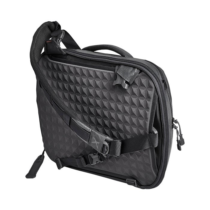 Product shot of Peak Design's Everyday Sling 6L bag featuring a dark gray geometric patterned fabric multiple adjustable straps and zippered compartments