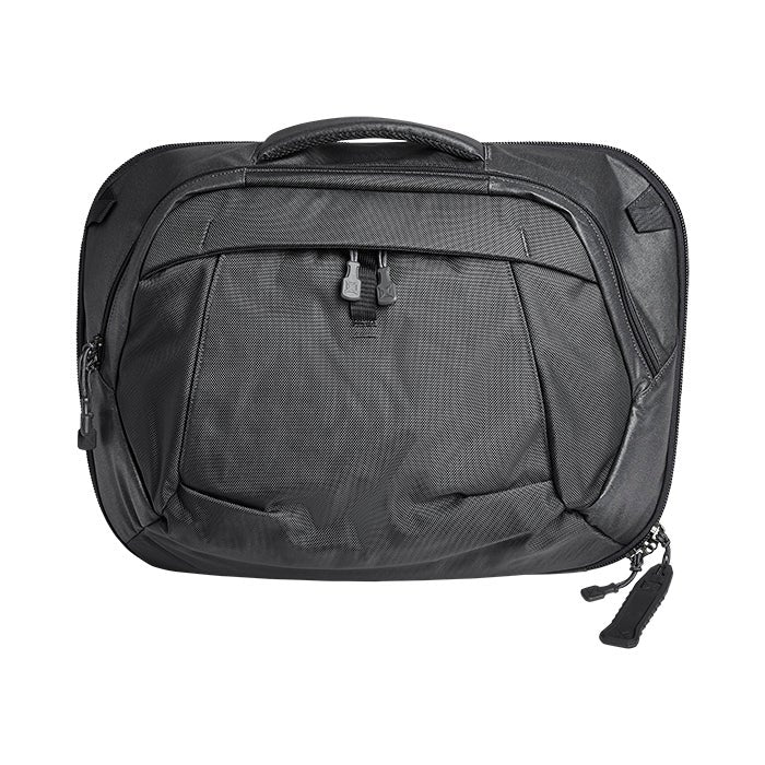 Product shot of a black Peak Design Travel Backpack with zippered compartments and a padded top handle showcasing durable fabric and sleek design