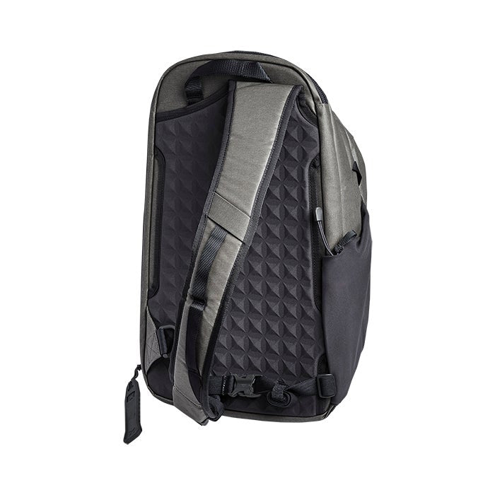 Product shot of a Peak Design Everyday Backpack showcasing its gray and black fabric geometric padded back panel adjustable shoulder strap and side pocket