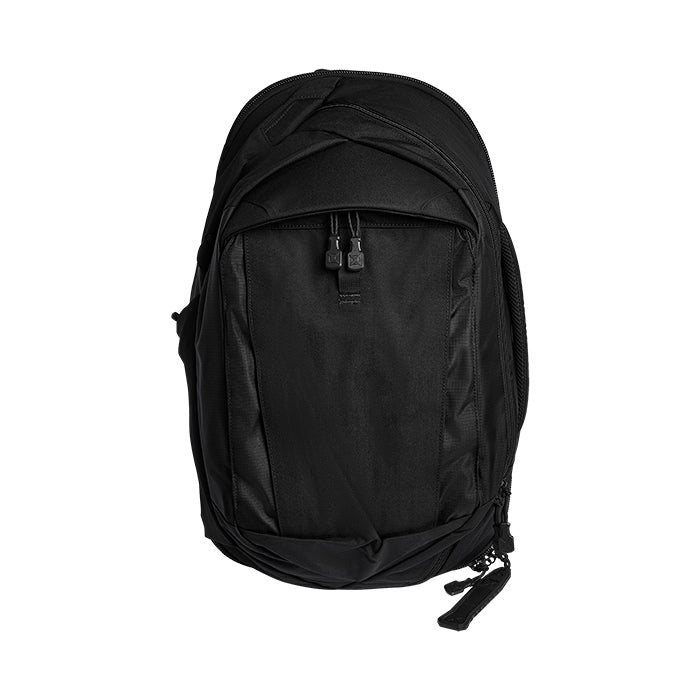 Product shot of a black backpack featuring multiple zipper compartments and a unique bottom design against a white background