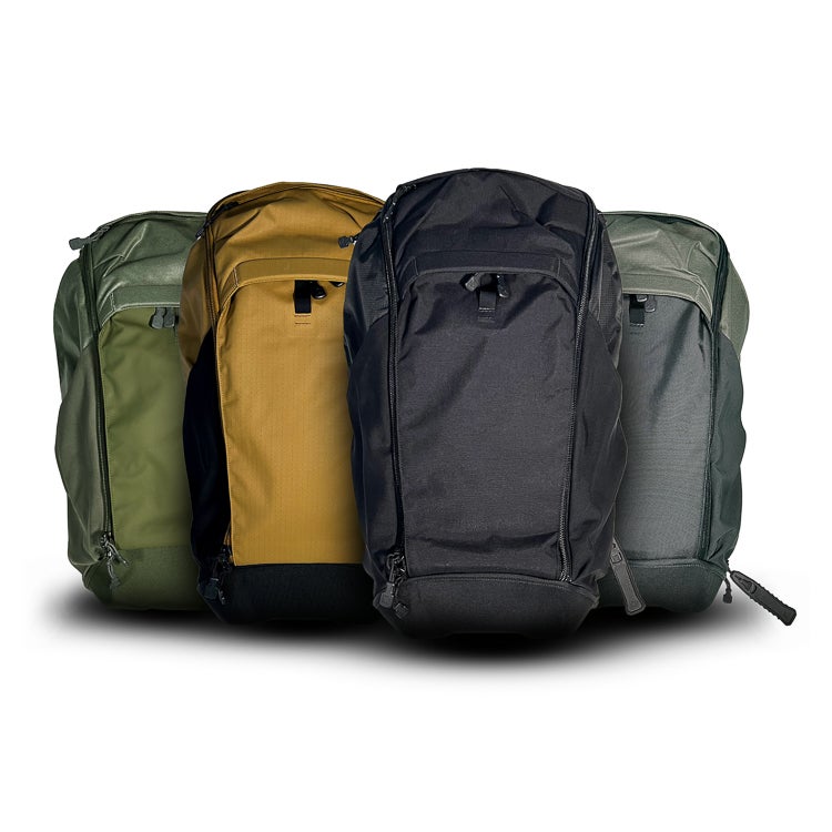 Product photography showing four backpacks in olive green tan black and grey on a white background featuring adjustable straps and zippered compartments