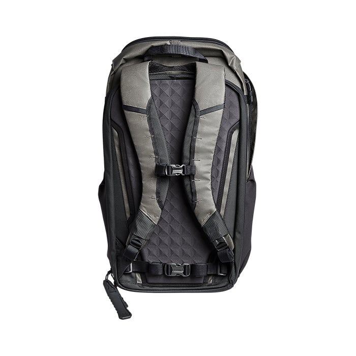 Product shot of a black and gray backpack featuring adjustable straps, a quilted back panel, and a unique side release buckle