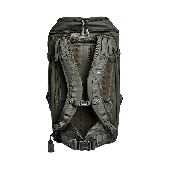 Product shot of a Mystery Ranch X17 backpack showcasing its olive-green color, padded back panel with geometric texture and adjustable sternum strap featuring multiple buckles and compression straps