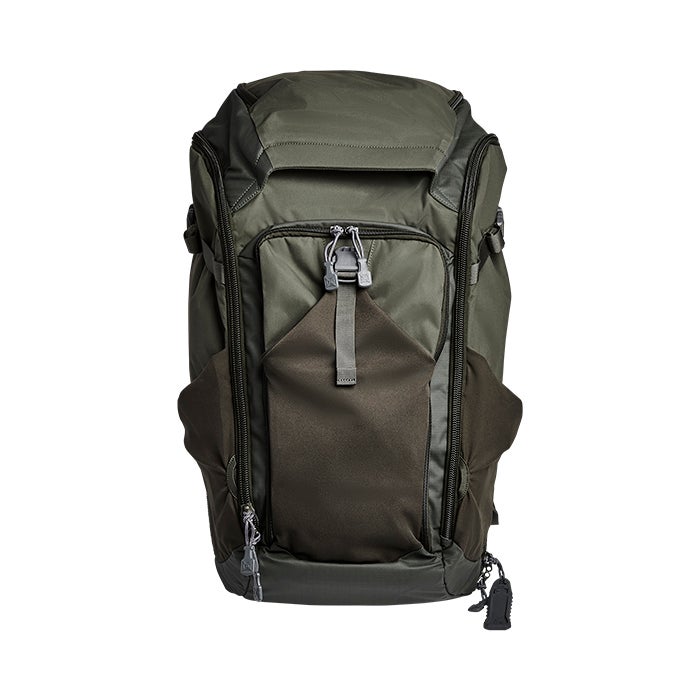 Product shot of a green and grey Shimoda Designs Explore 60 backpack featuring multiple zippered compartments and adjustable straps