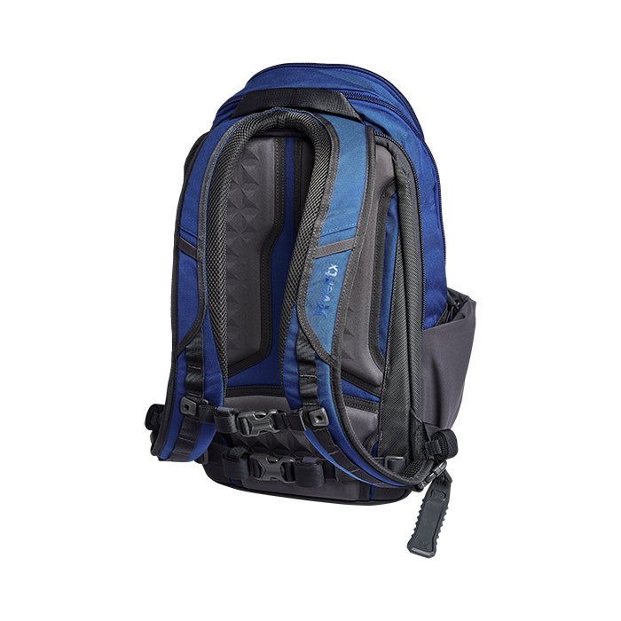 Product shot of a blue and gray Osprey Xena backpack featuring a mesh back panel adjustable straps and a sternum strap with a small lock