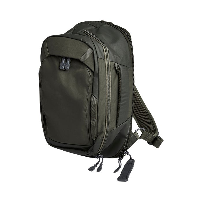 Product shot of a dark olive green Peak Design Travel Backpack featuring multiple zippered compartments adjustable straps and a unique compression system
