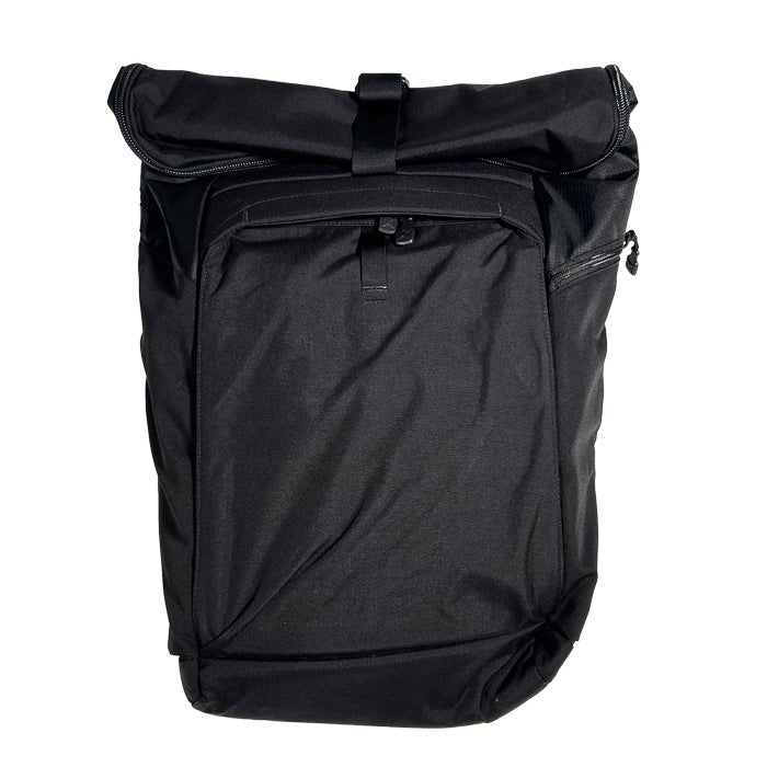 Product photography of a black roll-top backpack featuring a zippered front pocket, adjustable straps and sleek design
