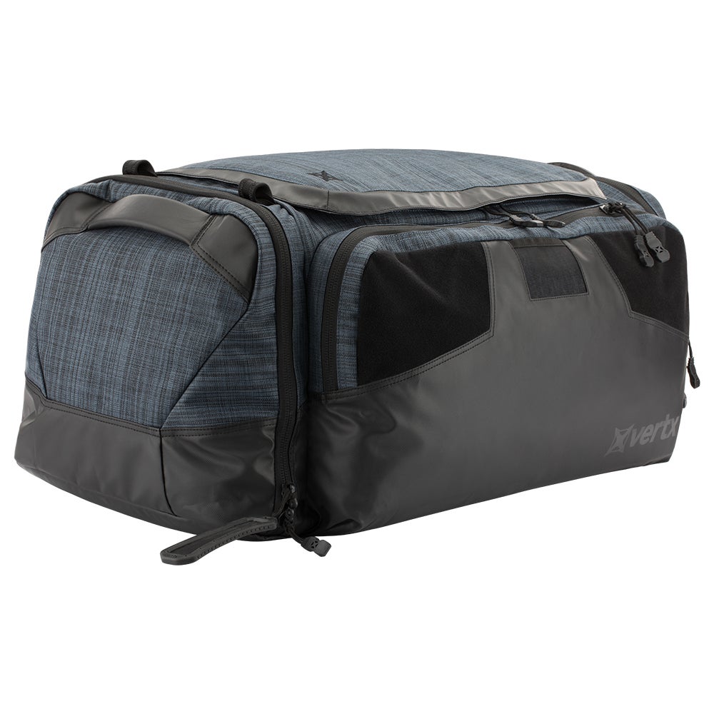 Product shot of a Vertx duffel bag featuring a gray and black textured fabric design with black accents and a rubberized zipper pull