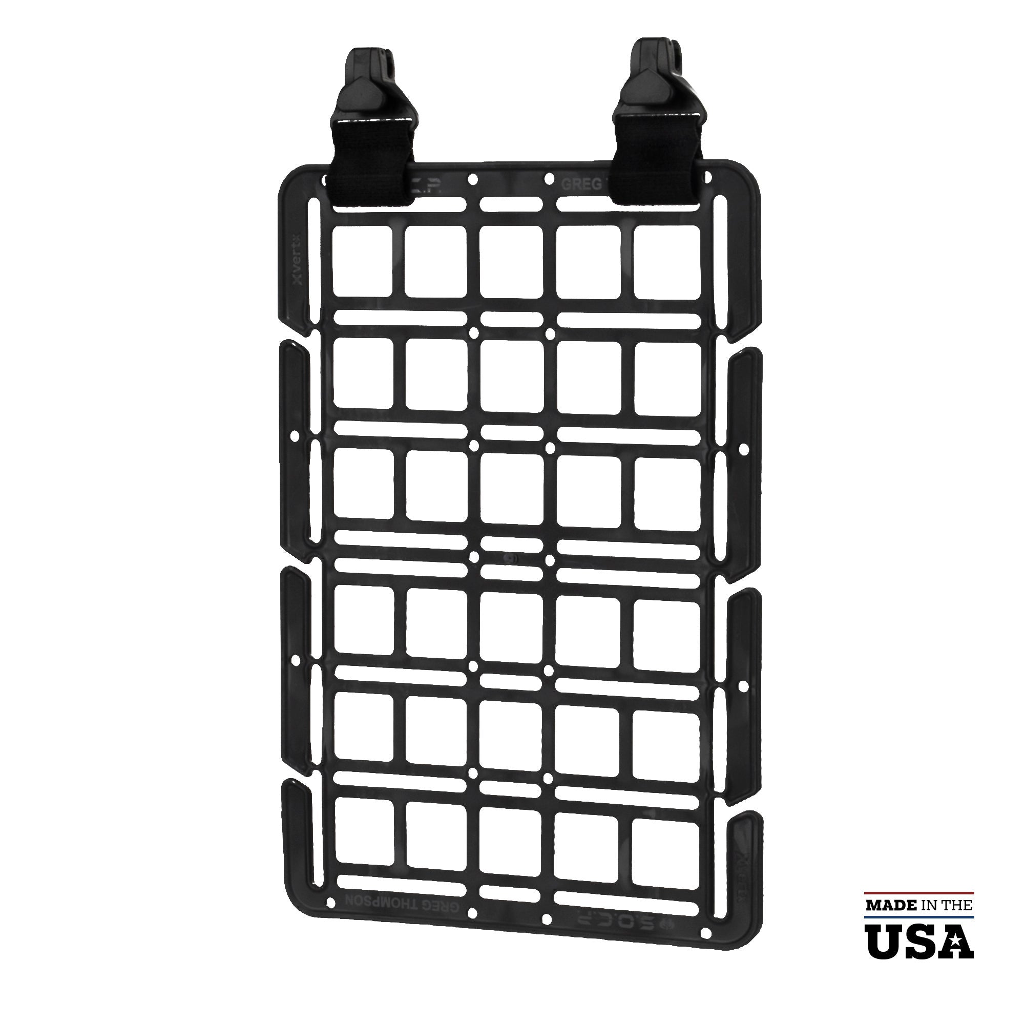 Product shot of a black plastic Greg Thompson 5.11 SOCP Grid Panel with two black straps and metal clips showing a grid pattern and subtle logos against a white background