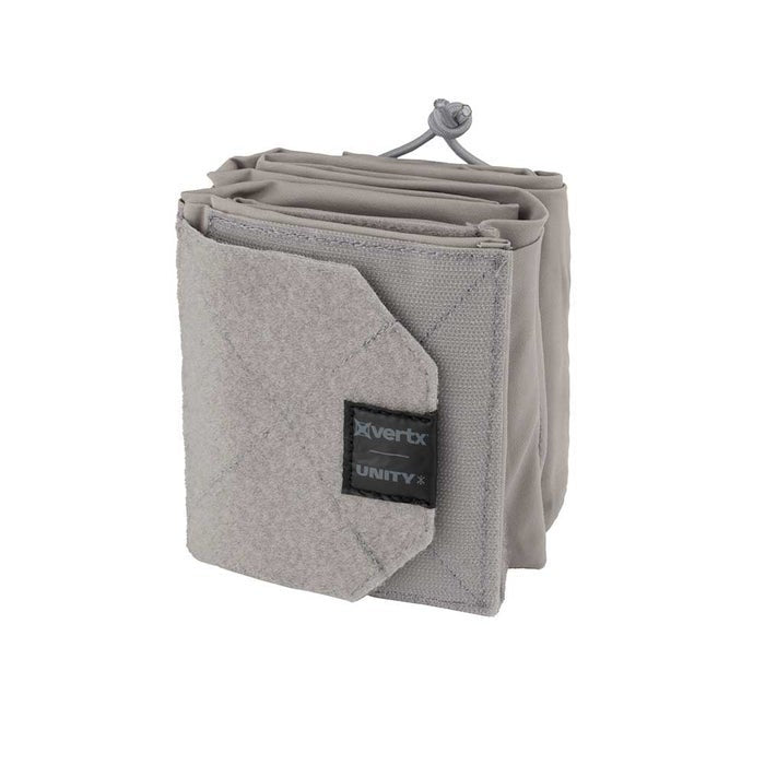 Product shot of a grey Vertx Unity pouch featuring a soft gray interior and a dark gray logo a drawstring closure and a unique folded design