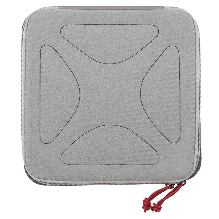 Product shot of a gray zippered case featuring a unique quilted pattern with dark gray stitching and red zipper pulls
