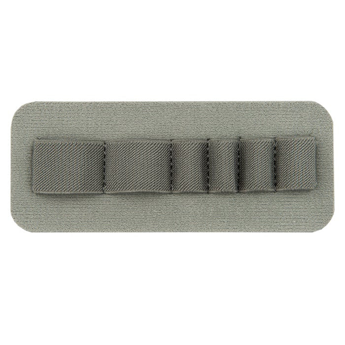 Close-up of a gray fabric pen holder with five slots showing a textured surface and subtle stitching details