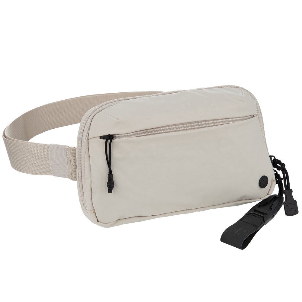 Product shot of a beige fabric fanny pack with black zipper, adjustable belt, and branded buckle detail