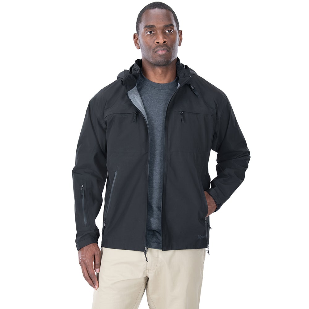 Product shot of a man wearing a black 5.11 Tactical Men's Rain Jacket against a white background showing its zippered pockets and gray interior hood.