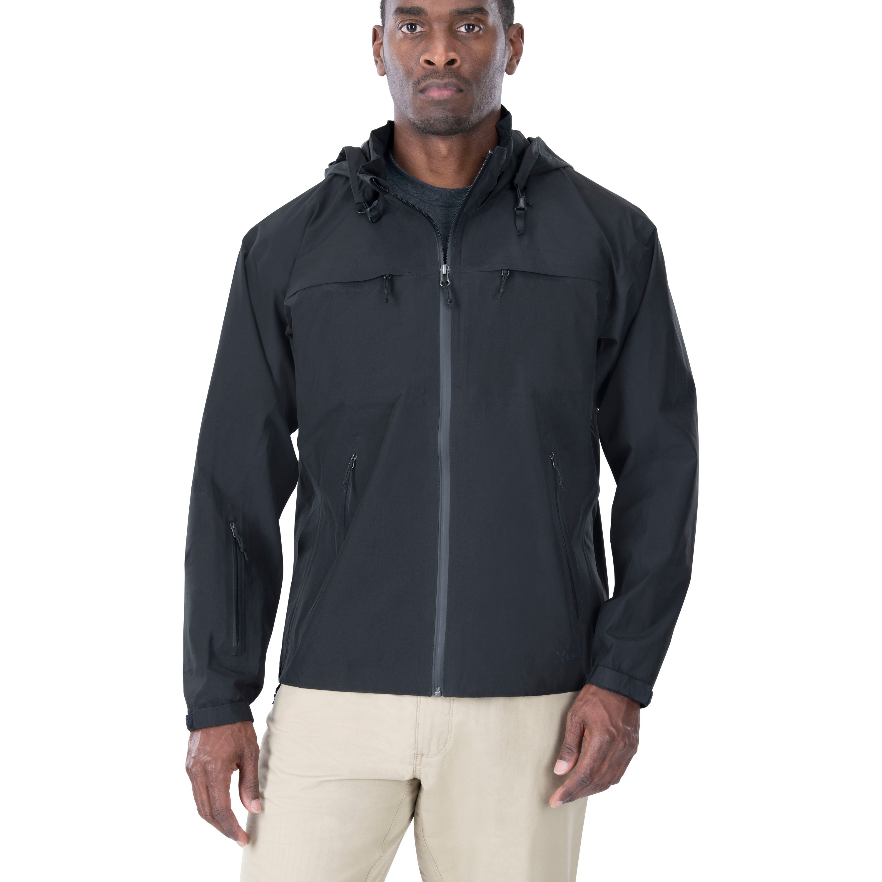 Product shot of a model wearing a black, zip-up jacket with multiple pockets and a drawstring hood against a white background.
