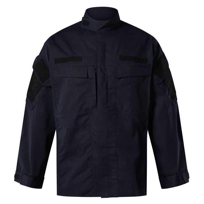 Product shot of a navy blue tactical long-sleeve shirt featuring black hook-and-loop patches and multiple pockets showing durable fabric and a sturdy zipper