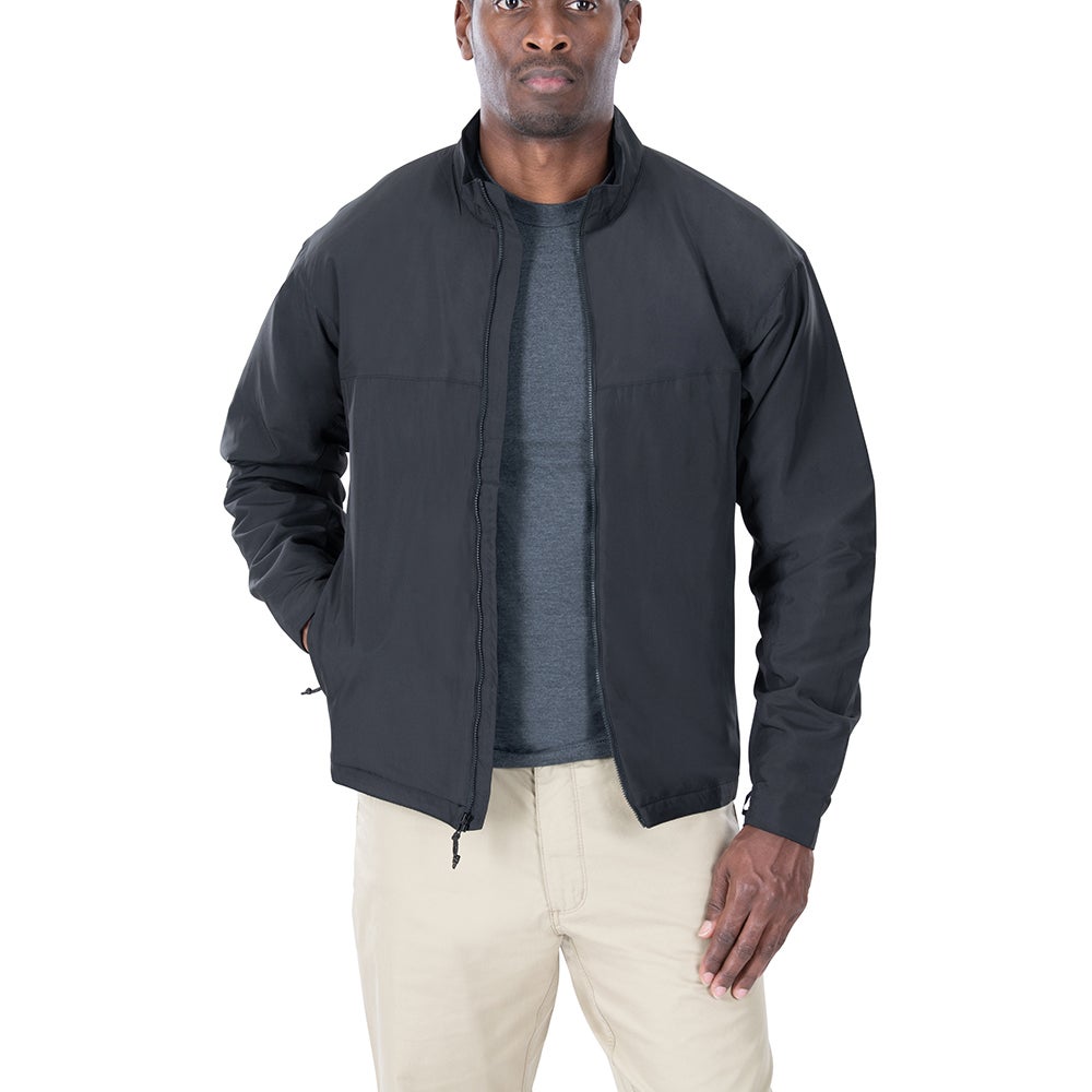 Product shot of a man modeling a black 5.11 Tactical jacket with zippered pockets and a stand-up collar against a white background