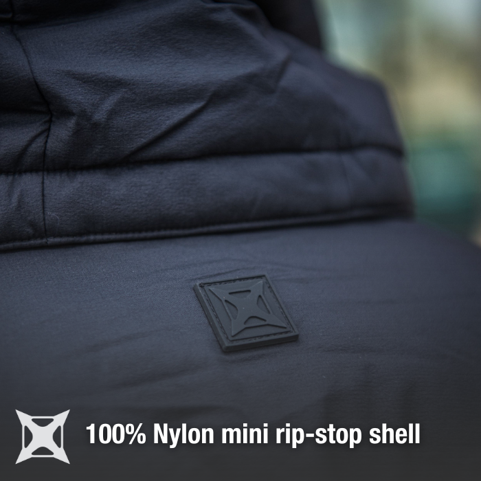 Close-up photograph of a black 100% nylon mini rip-stop shell jacket showing a textured, embossed logo and a padded collar