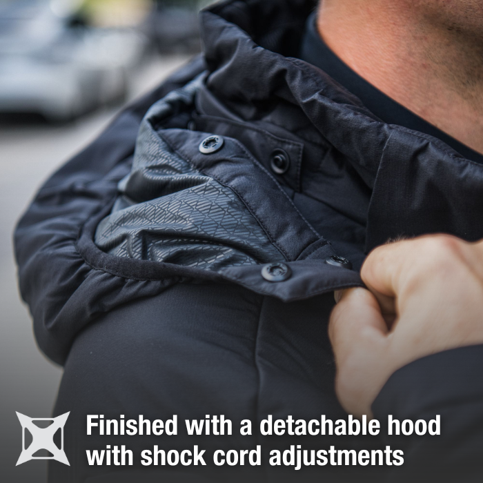 Close-up product shot showing a black jacket with a detachable hood featuring shock cord adjustments, a textured inner lining, and snap button closures