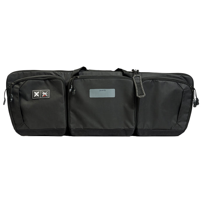 Product shot of a black Xertx rifle case featuring multiple zippered compartments a grey logo patch and tactical-style accents